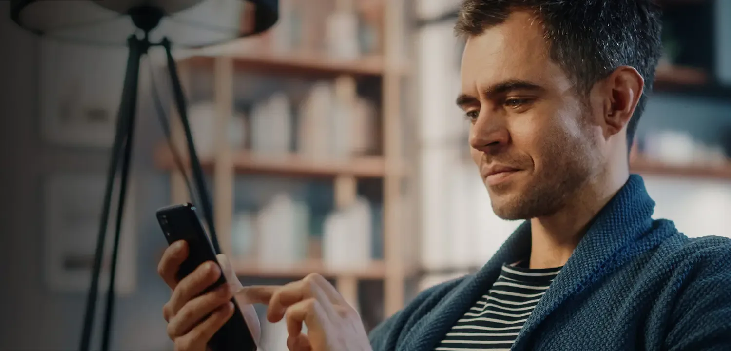 A man reading on his phone.
